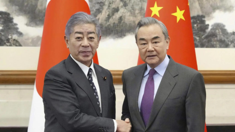 Japan's top diplomat in China to address 'challenges'