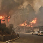 Palisades fire burns homes in wealthy Los Angeles neighborhood