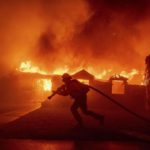 LA wildfire live: Thousands flee as California battles fire, power outages