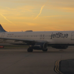 Passenger opens plane exit door at Boston airport after 'argument with girlfriend', sparks panic