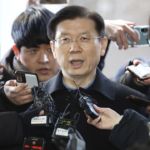 South Korea's acting leader accepts resignation of presidential security chief