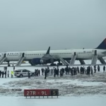 Watch: Delta aborts takeoff; 200 passengers deplaned on emergency slides in snow, 4 injured