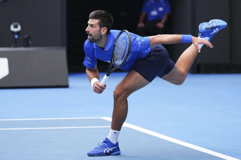 Djokovic breaks Grand Slam record, advances to Aus Open third round