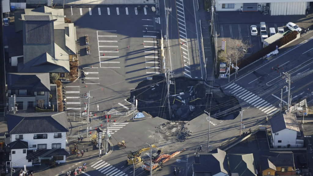 Japan tries to rescue man stuck in sinkhole. Here's what's going on.