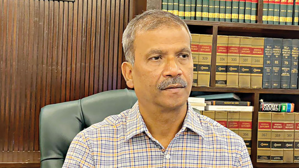 Govt has no intention of staying in office unnecessarily: law adviser