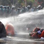 Batons and water cannons used to disperse protesters