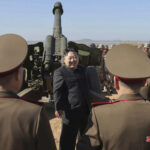 North Korea's Kim slams US-South Korea-Japan partnership and vows to boost his nuclear program