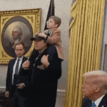 Watch: Elon Musk's son, perched on his father's shoulder, charms at Oval Office