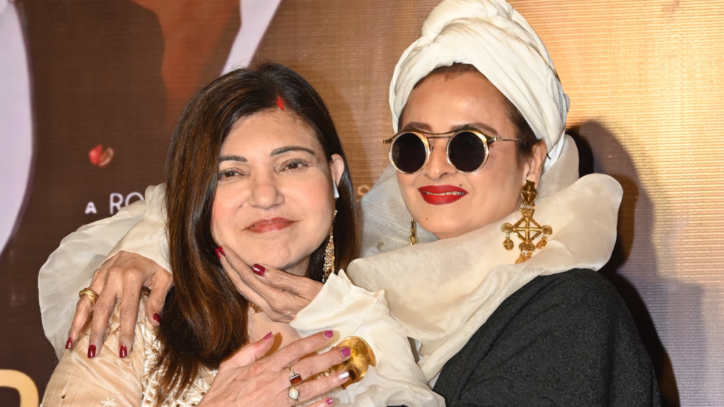 Rekha exudes retro grandeur in monotone look