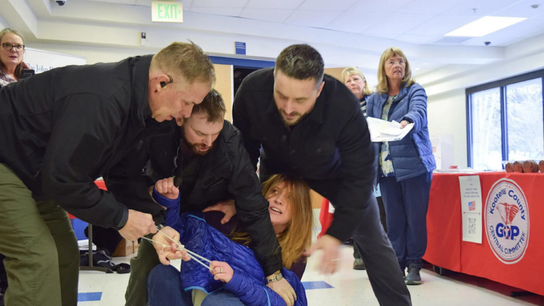 Watch: Chaos at Idaho town hall as woman removed by plainclothes security