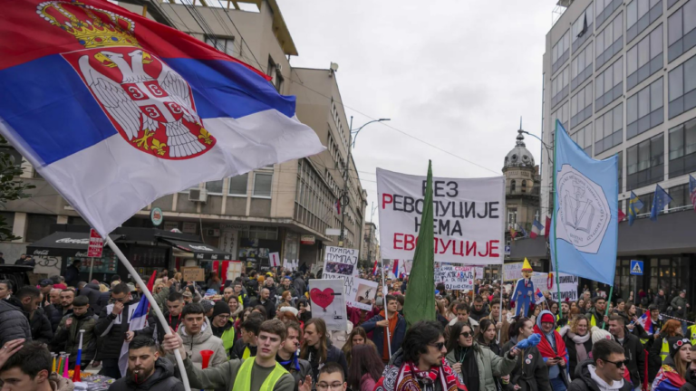 Serbia's president apologises for calling state TV reporter an 'imbecile' over coverage of protests